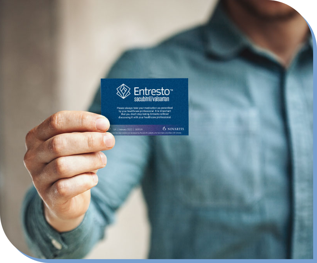 Man holding patient alert card